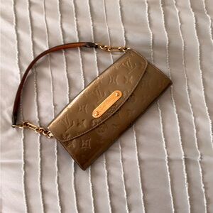 Louis Vuitton Gold Embossed Wristlet